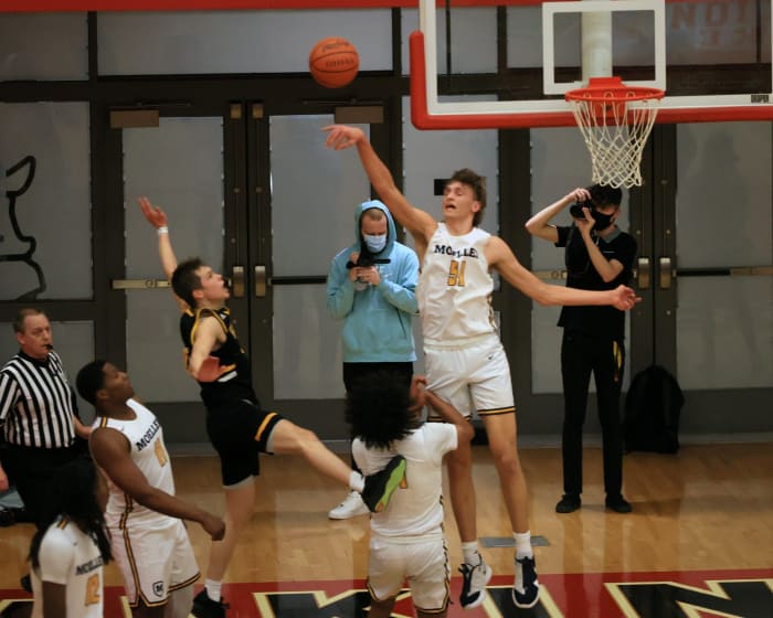Cincinnati Moeller center Logan Duncomb blocks the shot of Centerville's Gabe Cupps in the Division I regional finals game between Moeller and Centerville at Princeton High School on March 13, 2021. (Jim Owens/USA TODAY Sports)